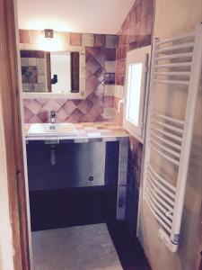 a bathroom with a sink and a mirror at Bargemon villa with modern interior and gorgeous view - with private pool and aircon in Bargemon