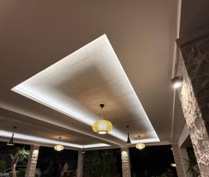 a ceiling with three lights on a building at B&B Guest House Vasiljevic in Herceg-Novi +34 photos