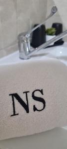 a sign on a sink with the letter k on it at NS Bolaños in Bolaños de Calatrava +38 photos