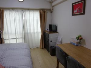 Televisyen dan/atau pusat hiburan di COCOSTAY Global Noboricho503