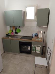 Kuchyň nebo kuchyňský kout v ubytování Appartamento Centro Otranto