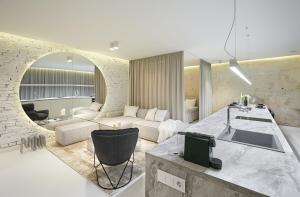 a living room with a couch and a table at Provokatas in Kaunas