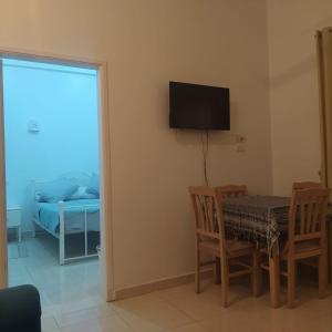 Μια τηλεόραση ή/και κέντρο ψυχαγωγίας στο Luxor Palm Villa