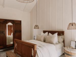 Postel nebo postele na pokoji v ubytování Sh'mah Guest Cottage