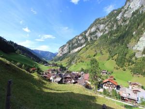 a village in a valley in the mountains at Apartment in Hüttschlag near Ski Bus in Hüttschlag
