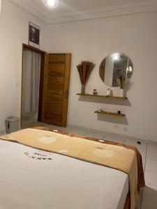 a large bed in a room with at YAN N' VI HOMe in Abidjan