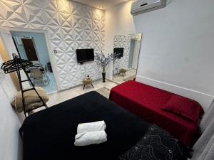 Μια τηλεόραση ή/και κέντρο ψυχαγωγίας στο Casa Próxima a Praia de SV