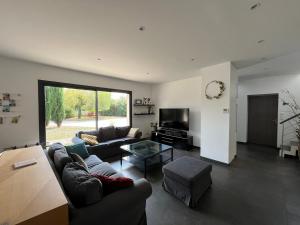 Χώρος καθιστικού στο Villa 2-10 pers repos et calme piscine jacuzzi Amboise