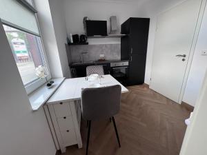 Η κουζίνα ή μικρή κουζίνα στο Charmantes Apartment