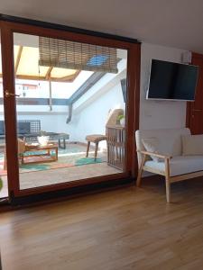 TV a/nebo společenská místnost v ubytování La Dimora di Deborah