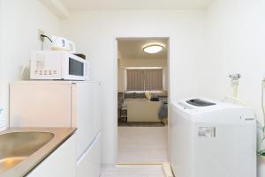 Kuchyň nebo kuchyňský kout v ubytování Maison Junes 21 + 14 fotografií