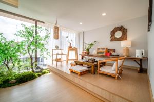 Fotografie z fotogalerie ubytování 市中心近海6卧奢华泳池别墅Alden Design Pool Villa v destinaci Pattaya North