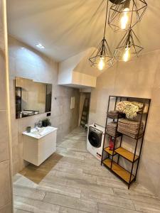 Η κουζίνα ή μικρή κουζίνα στο Апартамент золотой Бугаз Грибовка колоски