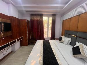 Imagine din galeria proprietății Haveliya Homes- Just 1 minute from Railway Station and Connaught place în New Delhi