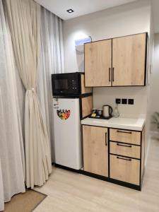 Gallery image of شاليه جريين اوايسس بمسبح وغرفة نوم واحده وصاله وجلسه خارجيه in Al Muţayrifī