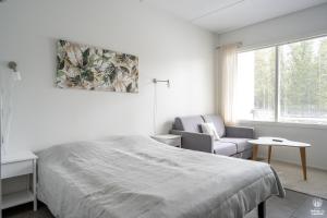 เตียงในห้องที่ Holiday in Lapland - Ylläs Sivulantie 4 108