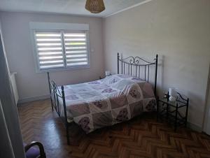 Postel nebo postele na pokoji v ubytování Maison rénovée