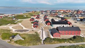 an aerial view of a small town next to the ocean at Ny lækker lejlighed på Havnen in Thyborøn