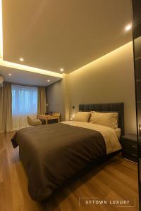 a bedroom with a large bed and a window at XIII 1d in Lisbon +28 photos