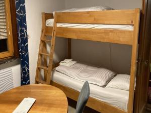 A bed or beds in a room at Holiday Home Seeboden near Ski & Lake Views