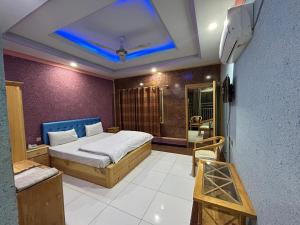 Katil atau katil-katil dalam bilik di Glorious Continental Hotel