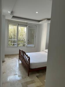 Ένα ή περισσότερα κρεβάτια σε δωμάτιο στο Duplex with Unobstructed Sea View Sidi Bou Saïd