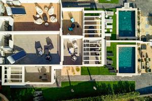 an aerial view of a house with a swimming pool at Casa Limon Ferienhaus bis 6 Gäste in Cala Pi mit Meerblick und privatem Pool in Niederdorla