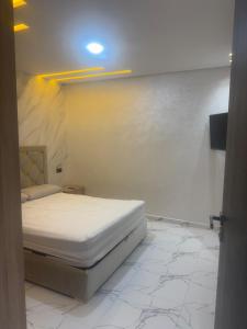 ナドールにあるApartmento Prestigeの部屋にベッドがある寝室