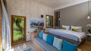 Ένα ή περισσότερα κρεβάτια σε δωμάτιο στο Miamai Boutique Hotel - Adult Only +91 φωτογραφίες