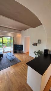 Posezení v ubytování Gemütliches 50qm Apartment mit Terrasse und Garten