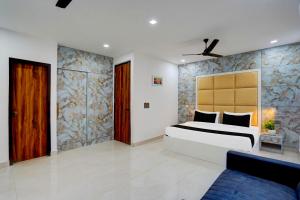 TV/trung tâm giải trí tại Super Townhouse Status By Sbg Near Anand Vihar Vaishali Metro Station +34 ảnh