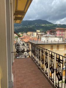 a balcony with a view of a city at Le Tortorelle in La Spezia