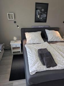 Postel nebo postele na pokoji v ubytování Büsum Nordseestraße 5 EG FeWo