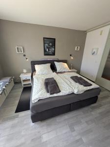 Postel nebo postele na pokoji v ubytování Büsum Nordseestraße 5 EG FeWo