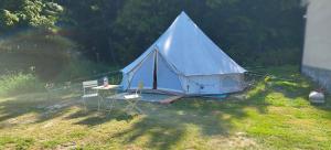 a blue tent sitting on top of a field at Glamping in nature in Zlín