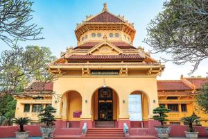 a building with a tower on top of it at Flower Homestay-Grand opening-VIP Homestay Local-Indochic-4Bedrooms in Hanoi