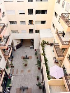 an overhead view of a courtyard in a building at Cozy Relax in Mohammedia