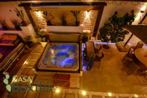 an overhead view of a living room with a hot tub at Casa Boxtha in Ixmiquilpan