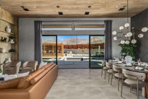 a living room with a couch and a table at Pool-Pickleball-YogaDeck in Joshua Tree
