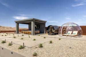 a gazebo and a tent in the desert at Pool-Pickleball-YogaDeck in Joshua Tree