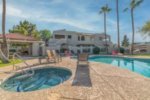 a swimming pool with chairs and a house at Tempe Room Private Bath Walk to ASU & Mill in Tempe +22 photos