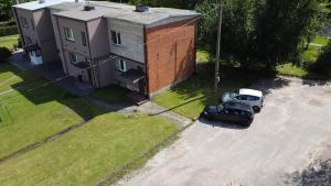 an aerial view of a car parked in front of a house at Julia's Apartment in Ginkūnai