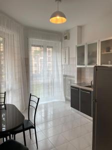 Kuchyň nebo kuchyňský kout v ubytování Bilocale - Zona San Paolo