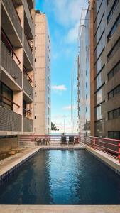 Kolam renang di atau dekat dengan Flat Recife Navegantes - 50 metros da praia