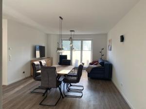 Posezení v ubytování Lichtdurchflutete Ferienwohnung im Erholungsort Tarp