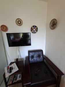 Una televisión o centro de entretenimiento en Pavlov24-Venkovský dům