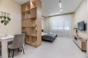 TV a/nebo společenská místnost v ubytování Квартира рядом с Мегой и Арбатом