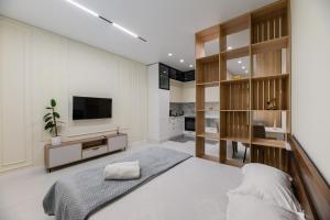 Postel nebo postele na pokoji v ubytování Квартира рядом с Мегой и Арбатом