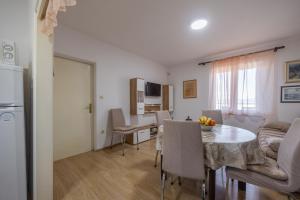 Kuchyň nebo kuchyňský kout v ubytování Apartment Toma + 24 fotografií