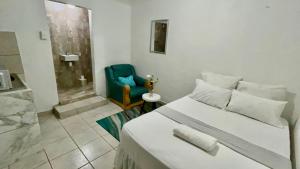 Katil atau katil-katil dalam bilik di Guest room and apartment
